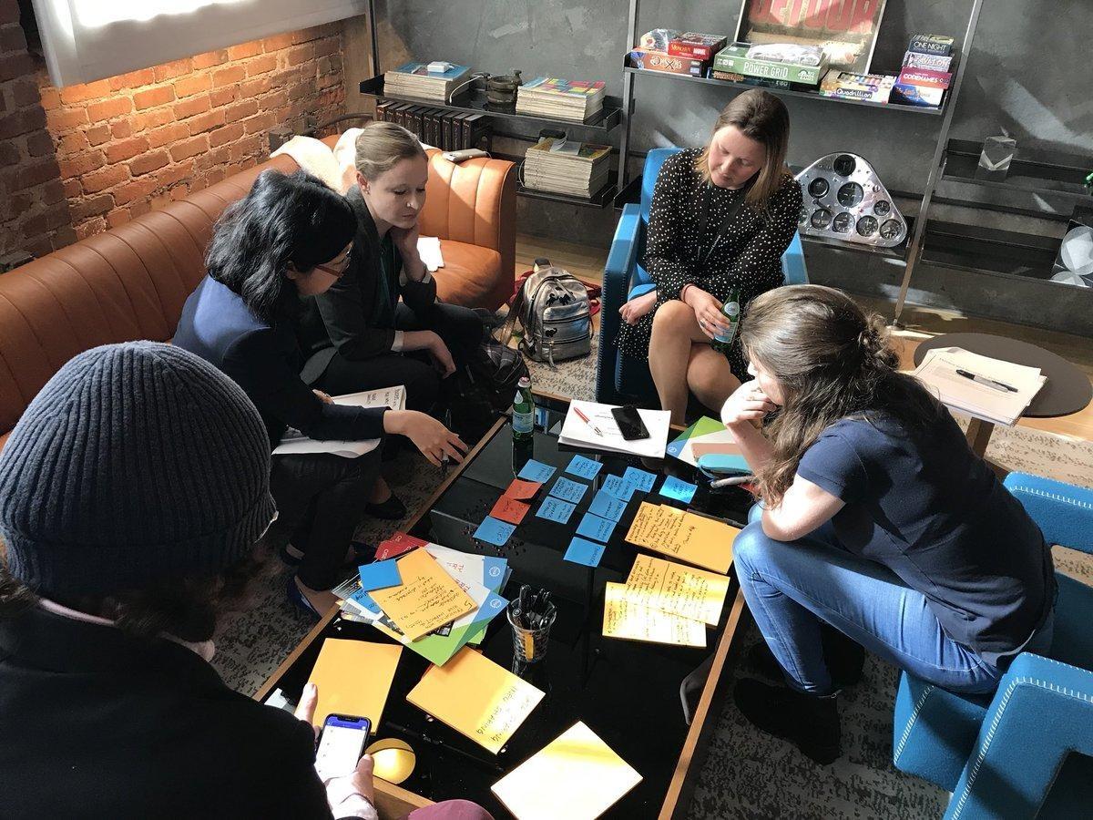 People working around a table.