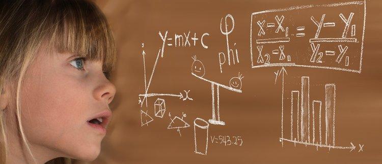 Child looking at math equations