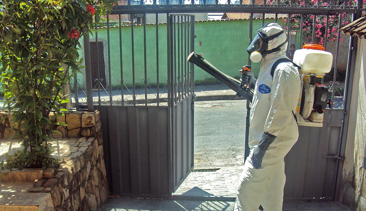 Man spraying mosquitos, by Portal PBH on Flickr.