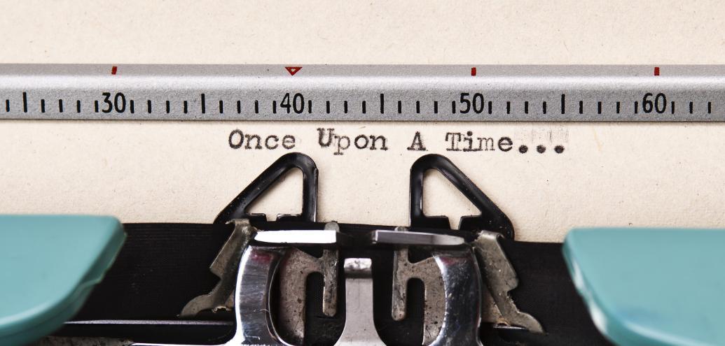 Close up of a typewriter, with the text "Once Upon a Time."
