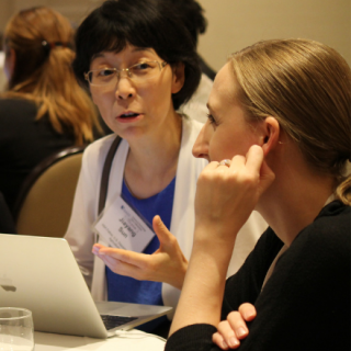 First-year fellows network at their orientation.