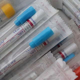 A pile of lab test swabs.